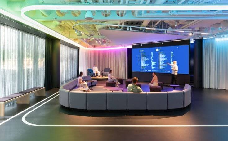 Connect space with lounge seating and cafe tables for socialising and networking