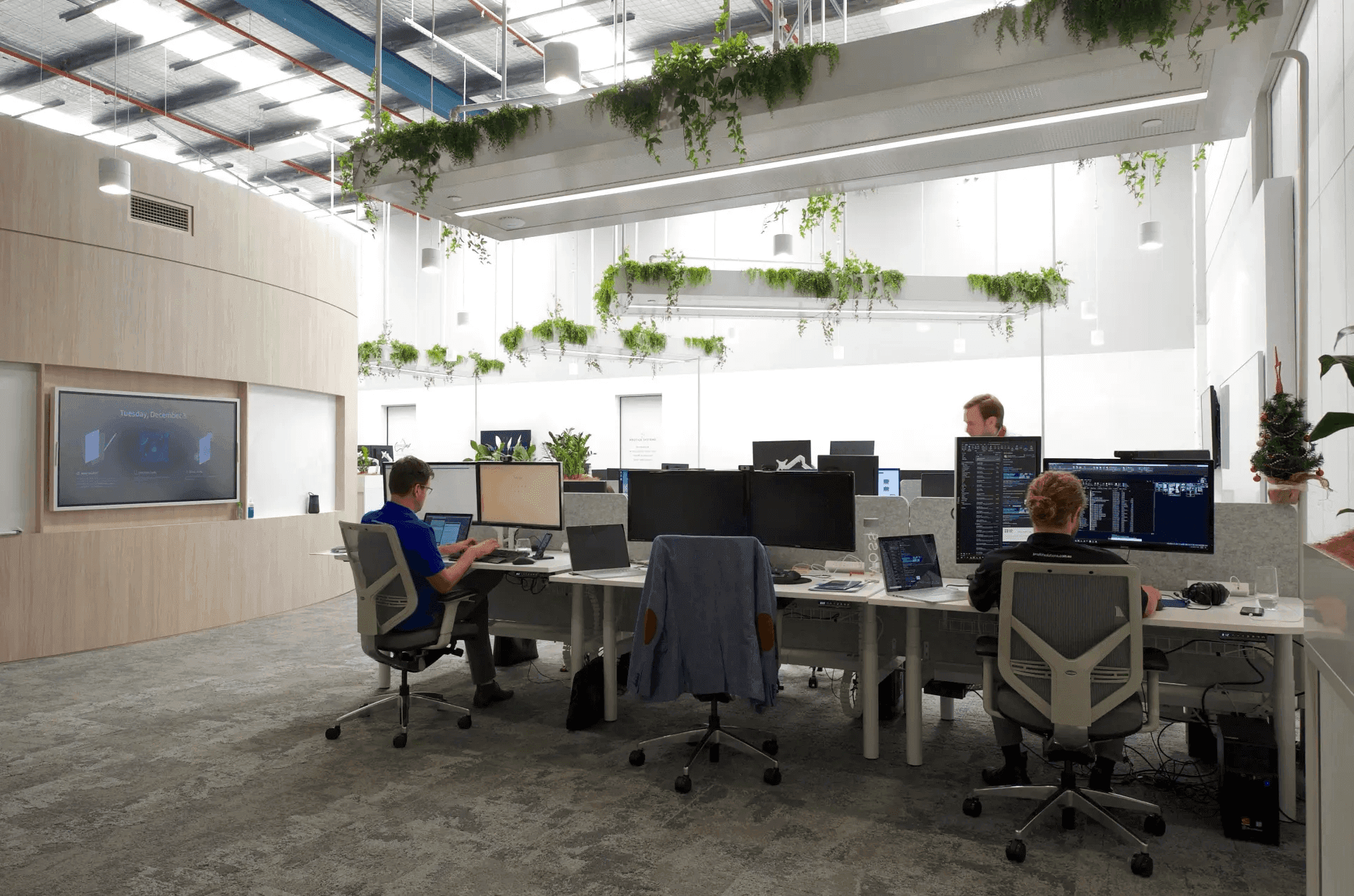 Hybrid office layout with touchdown desks and video conferencing spaces